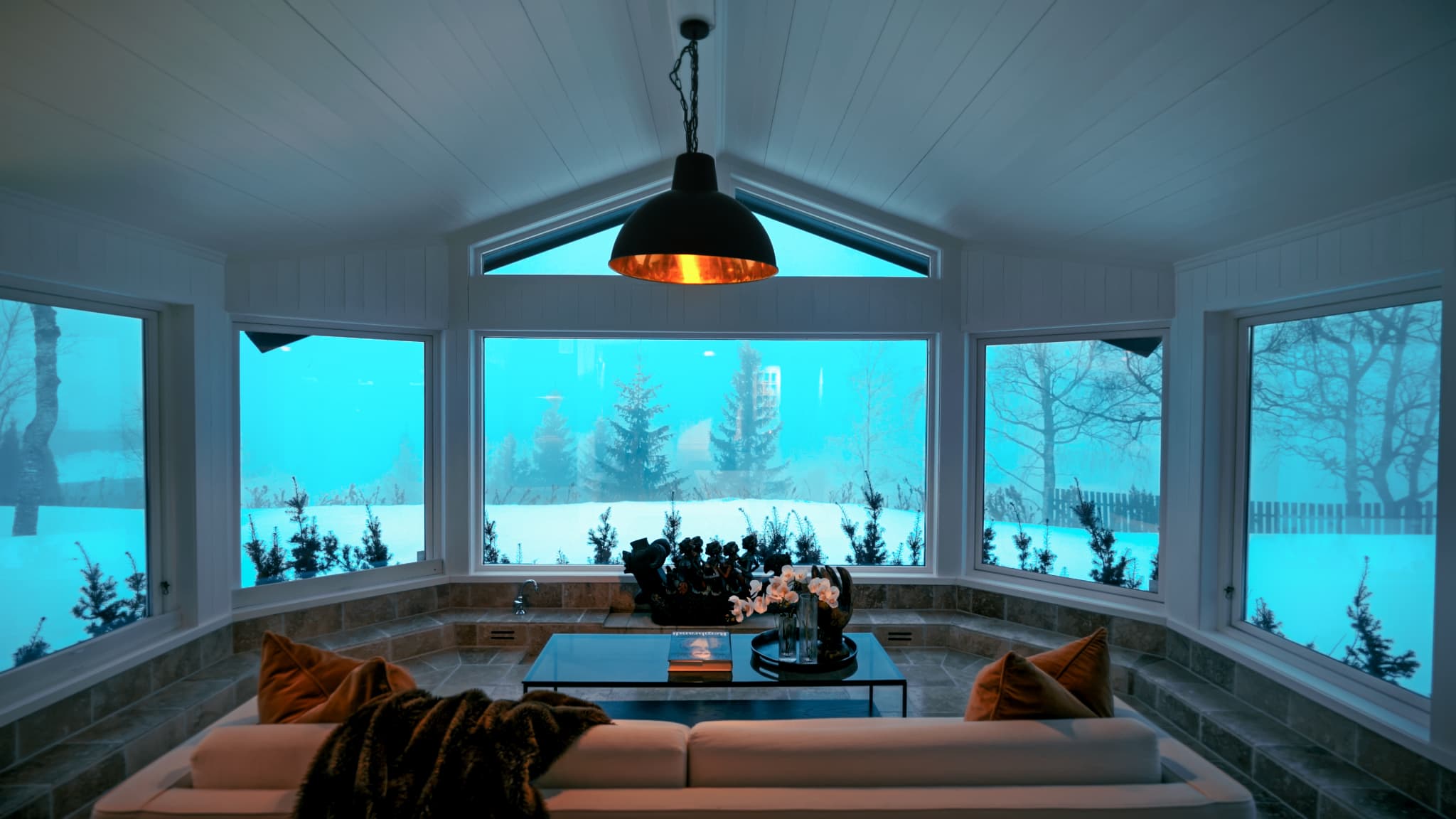 Norwegian fjord villa in winter with Northern Lights